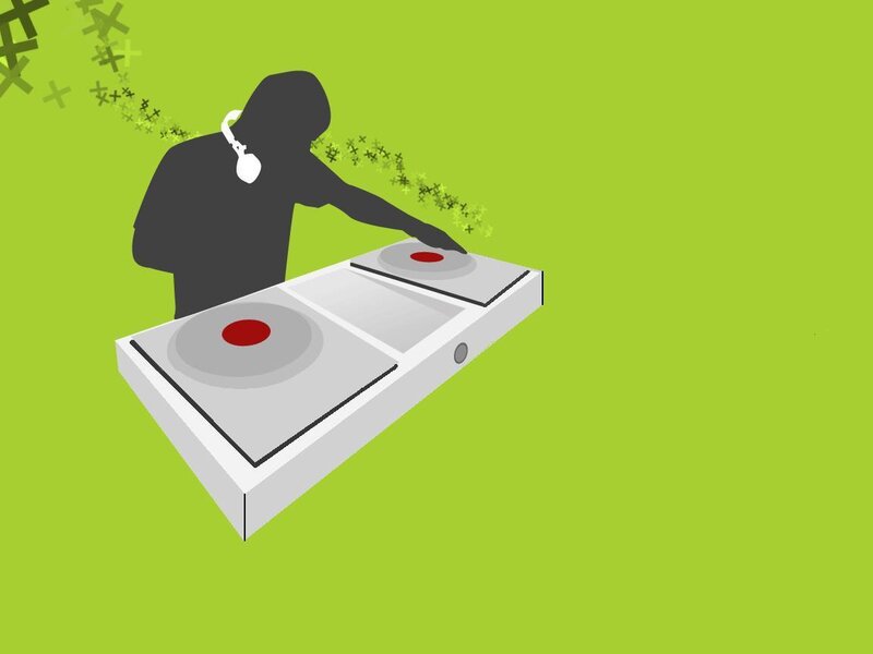 DJ at turntable with headphones