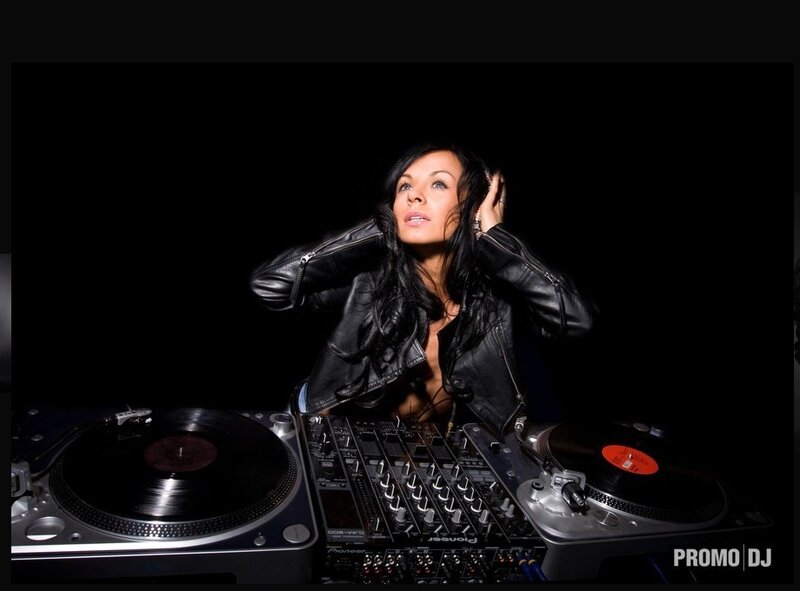 DJ at turntables with headphones