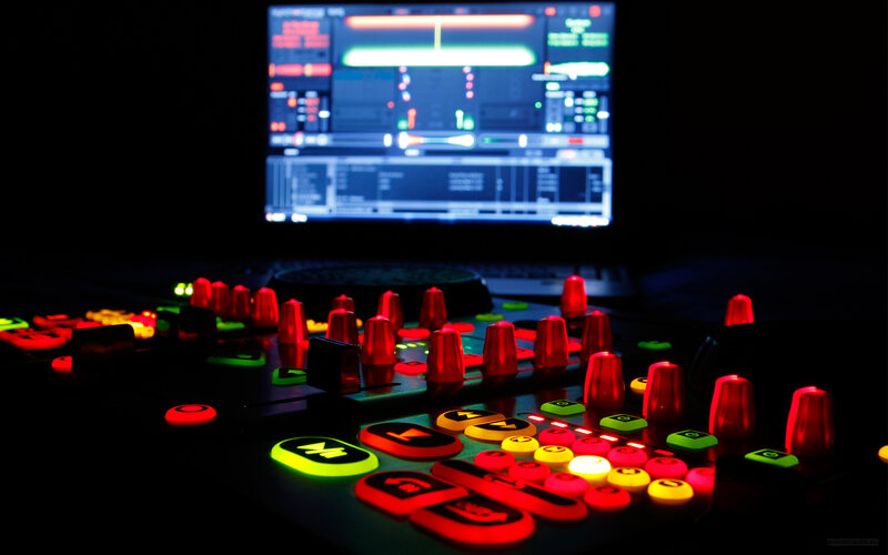 DJ controller with glowing buttons