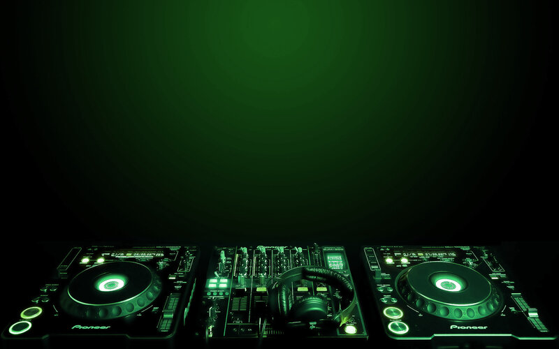 DJ equipment in green light