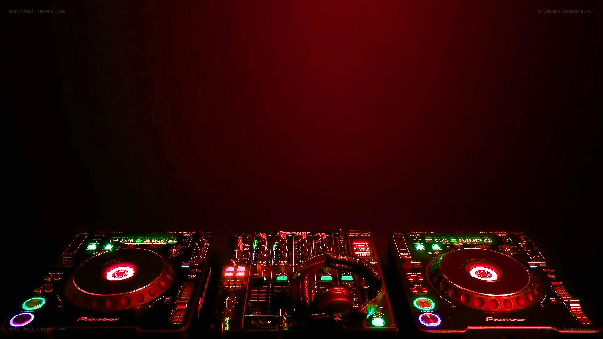 DJ equipment in red light