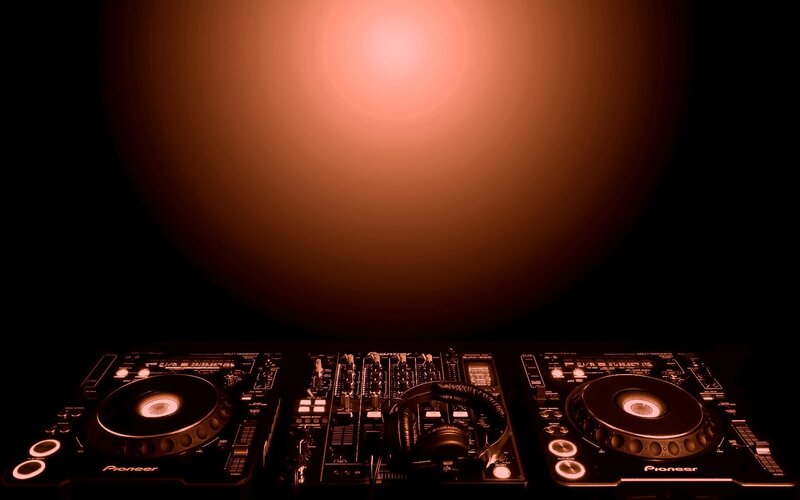 DJ equipment under red light