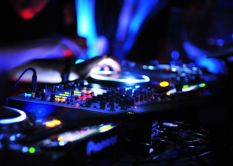 DJ mixing at a club