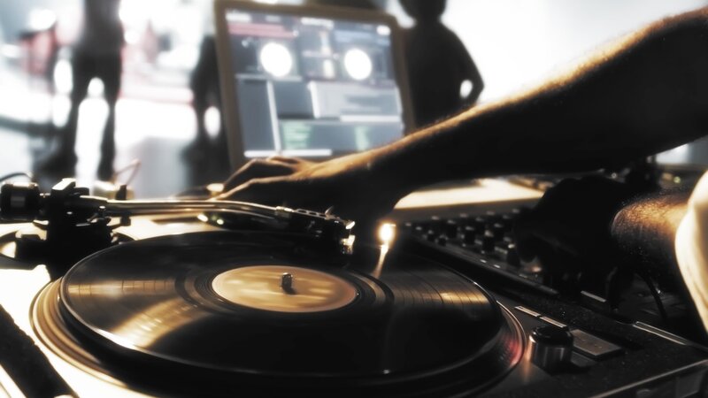 DJ mixing music at a club
