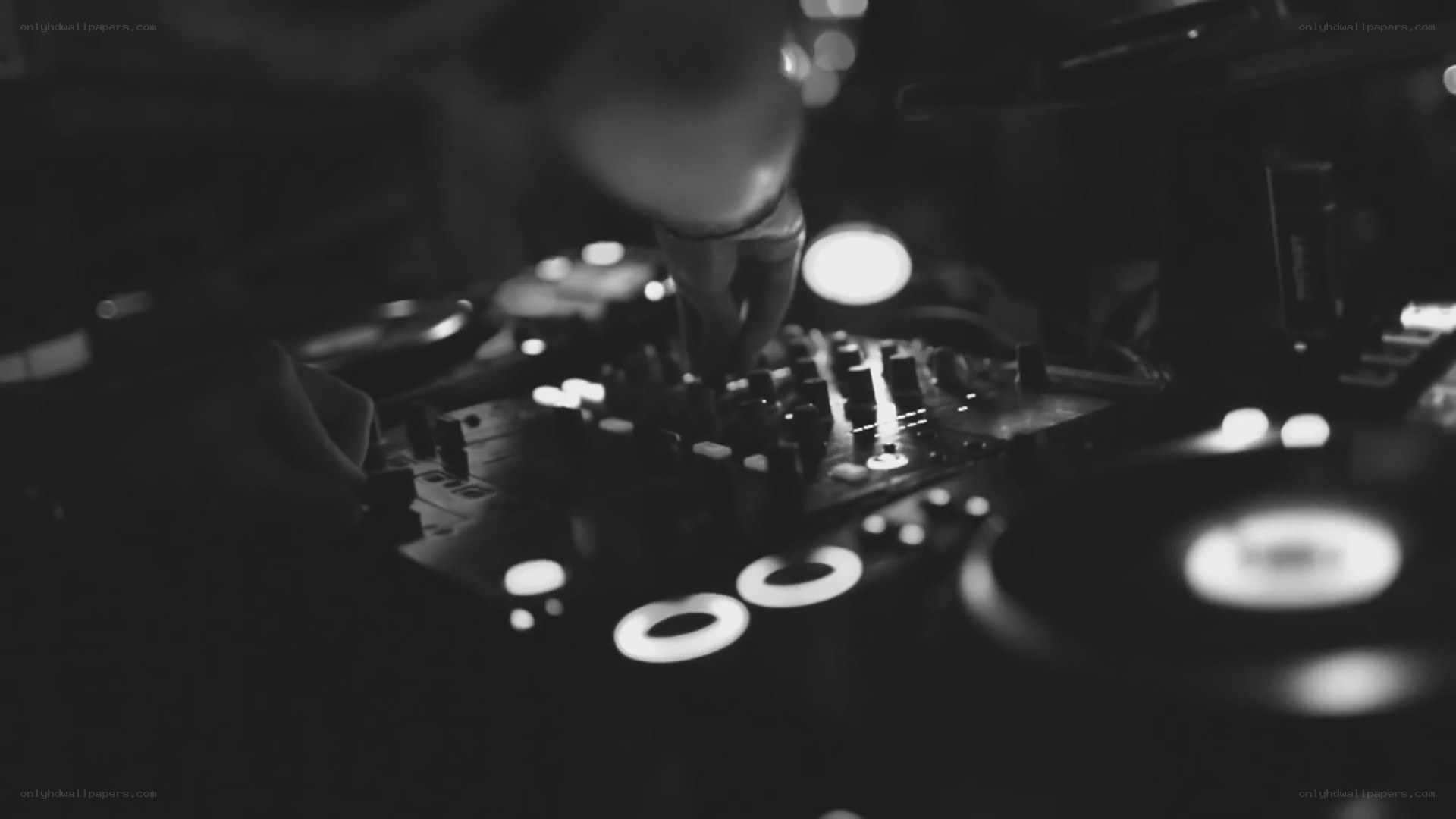 DJ mixing music at night