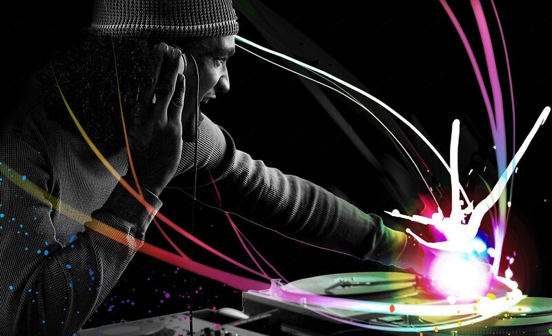 DJ mixing music with colorful lights