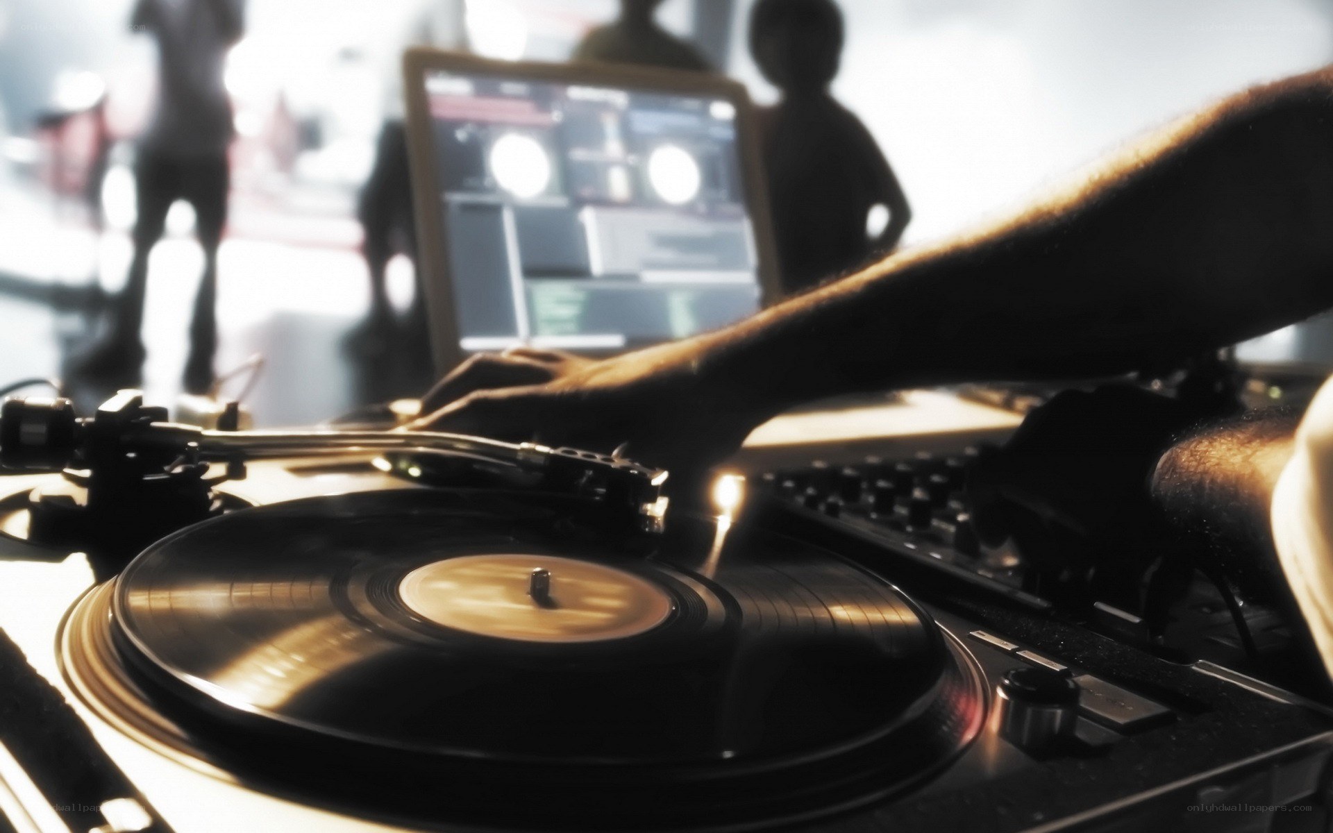 DJ mixing on turntables