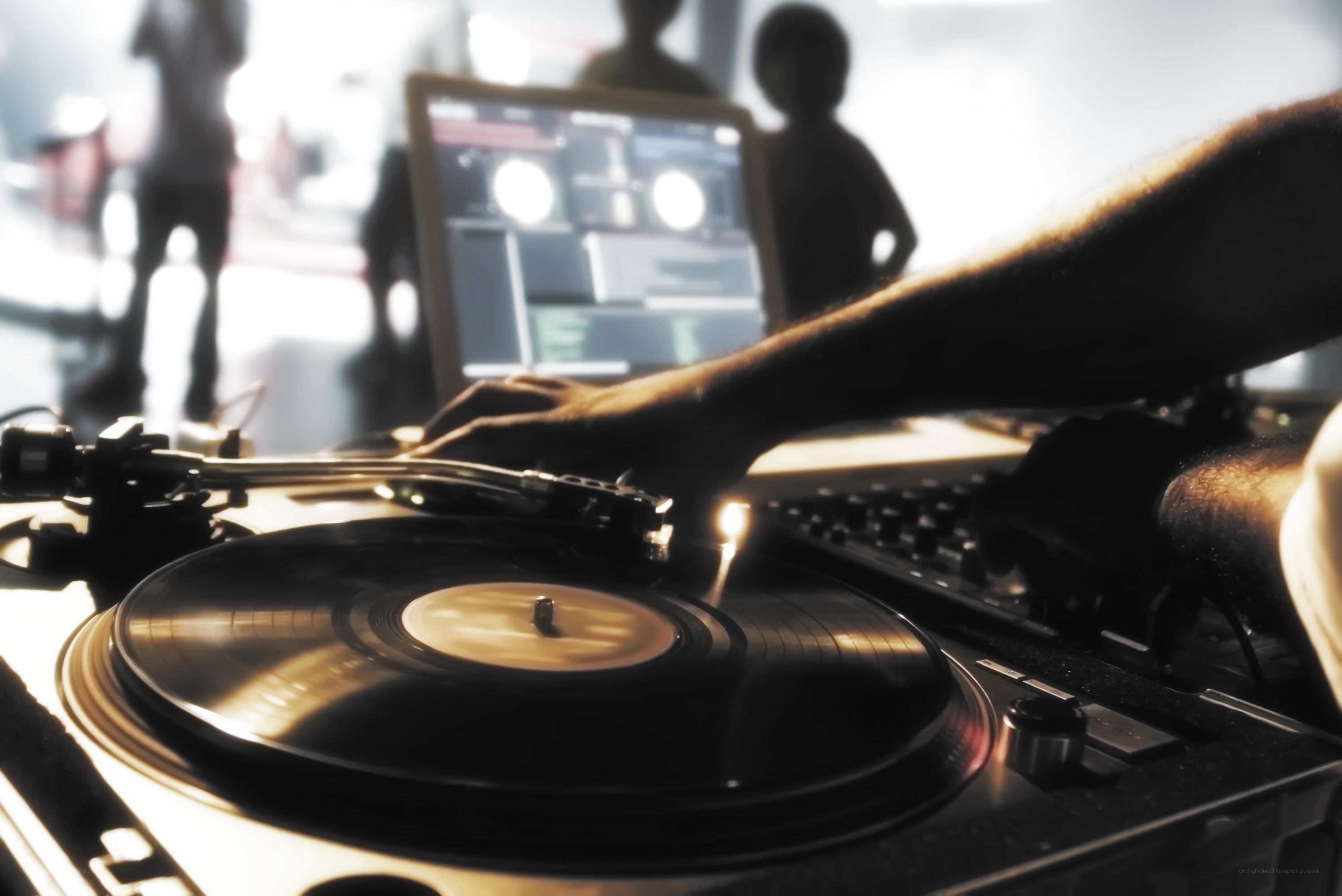 DJ mixing on turntables