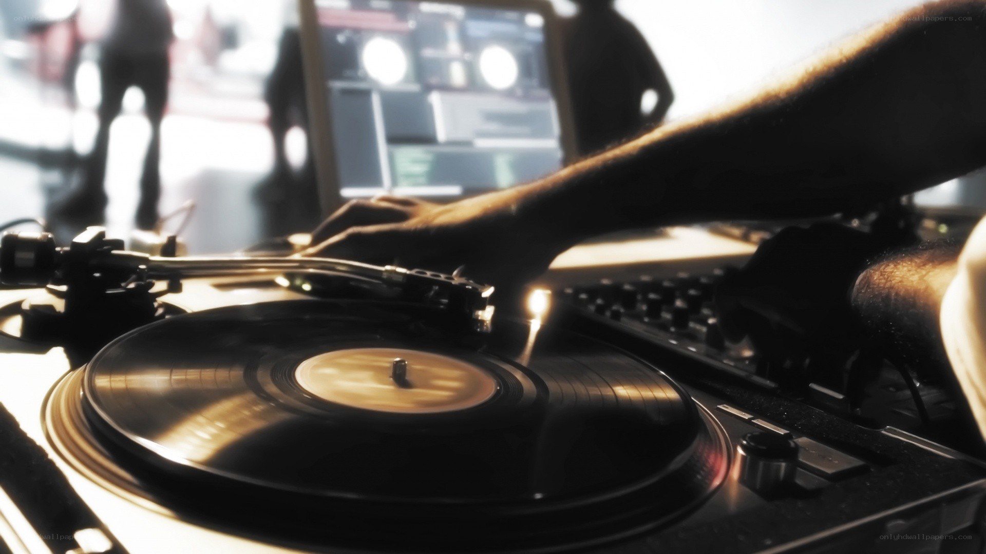 DJ mixing on turntables