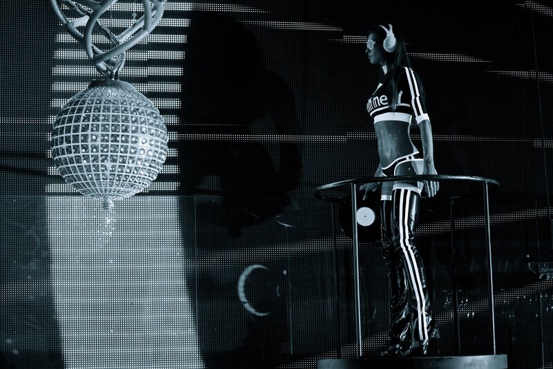 DJ on stage with disco ball