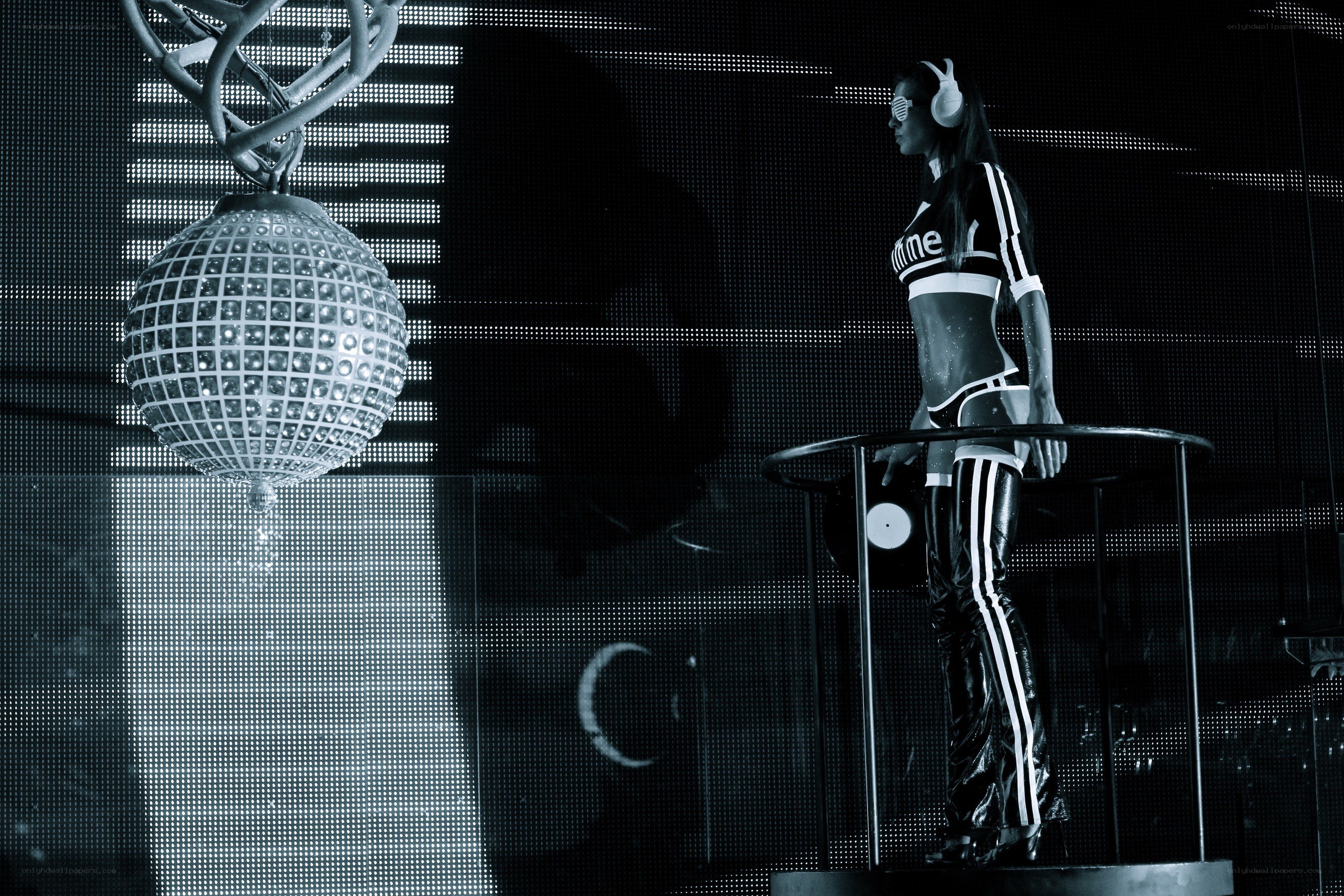 DJ on stage with disco ball