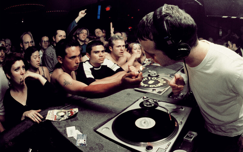 DJ Performing at Club — Black, Energetic