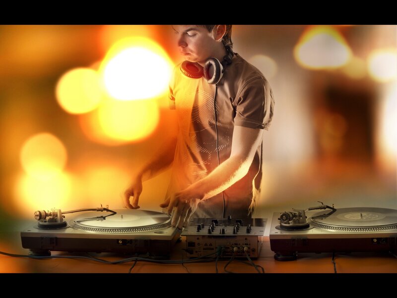 DJ performing at turntables