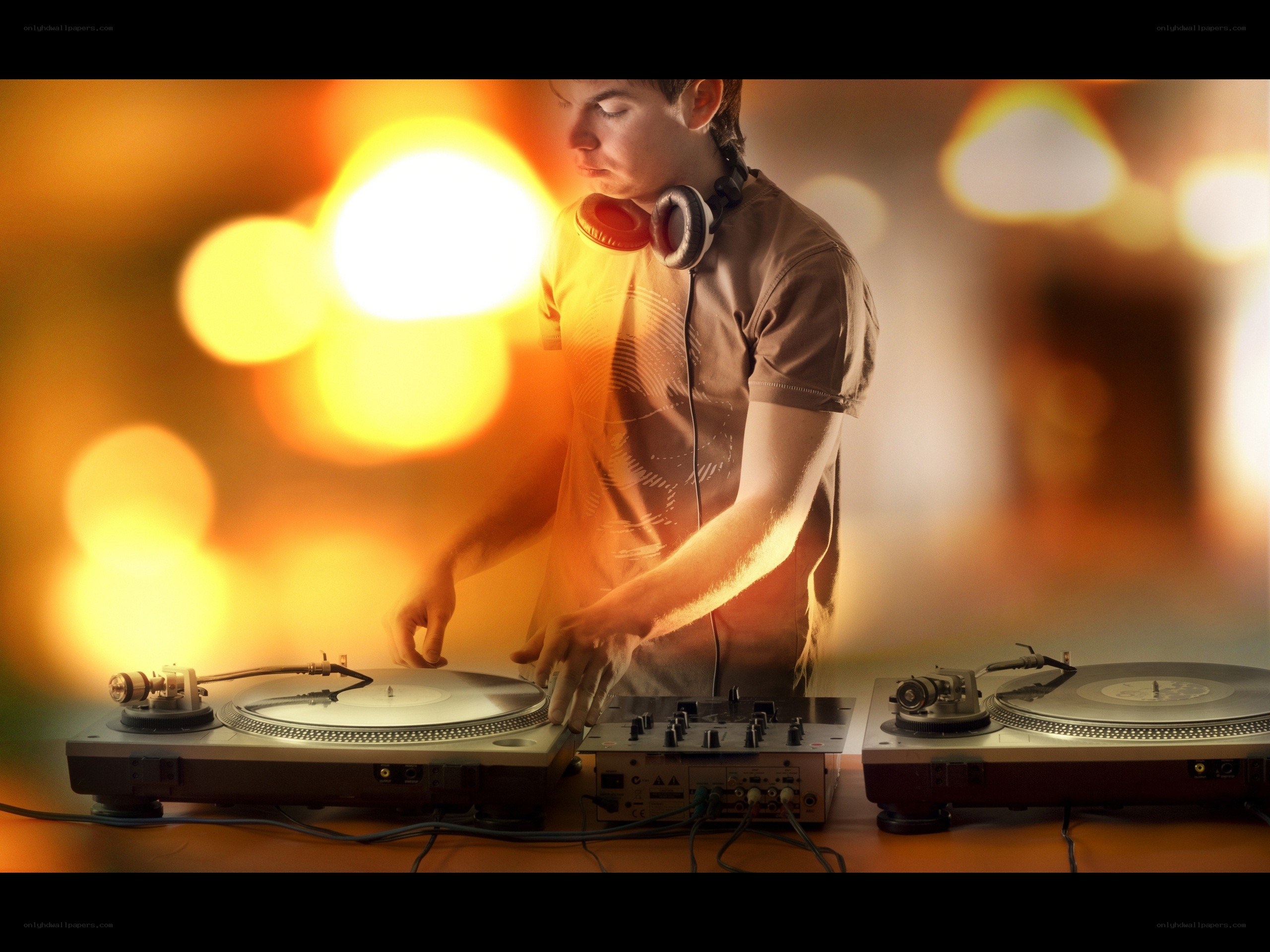 DJ performing at turntables