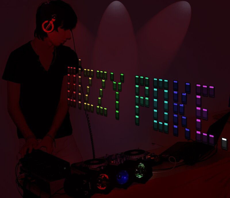 DJ performing in a dark room