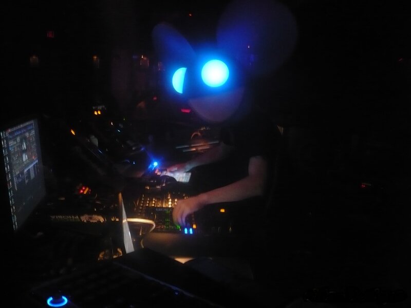 DJ performing in dark room