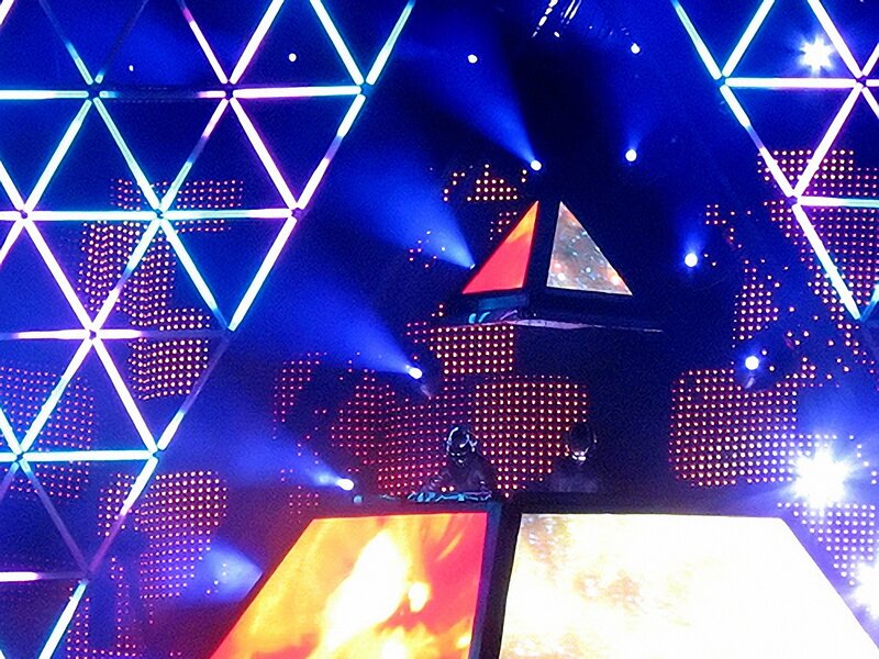 DJ Performing on Stage — Blue, Energetic, Night, Photograph