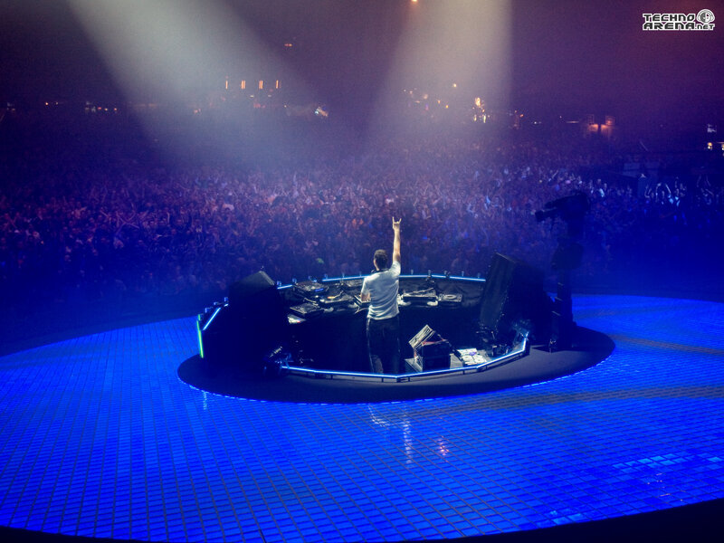DJ Performing on Stage — Blue, Energetic