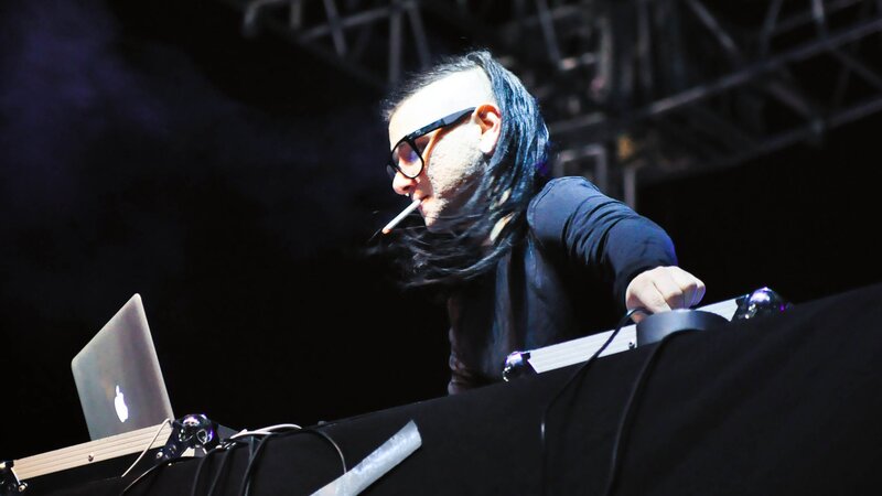 DJ performing with laptop