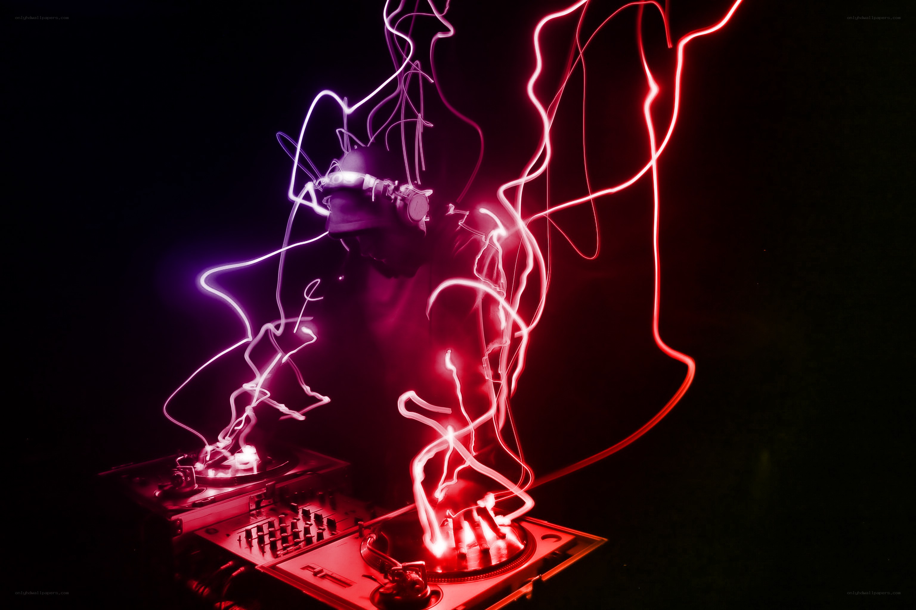 DJ performing with light trails