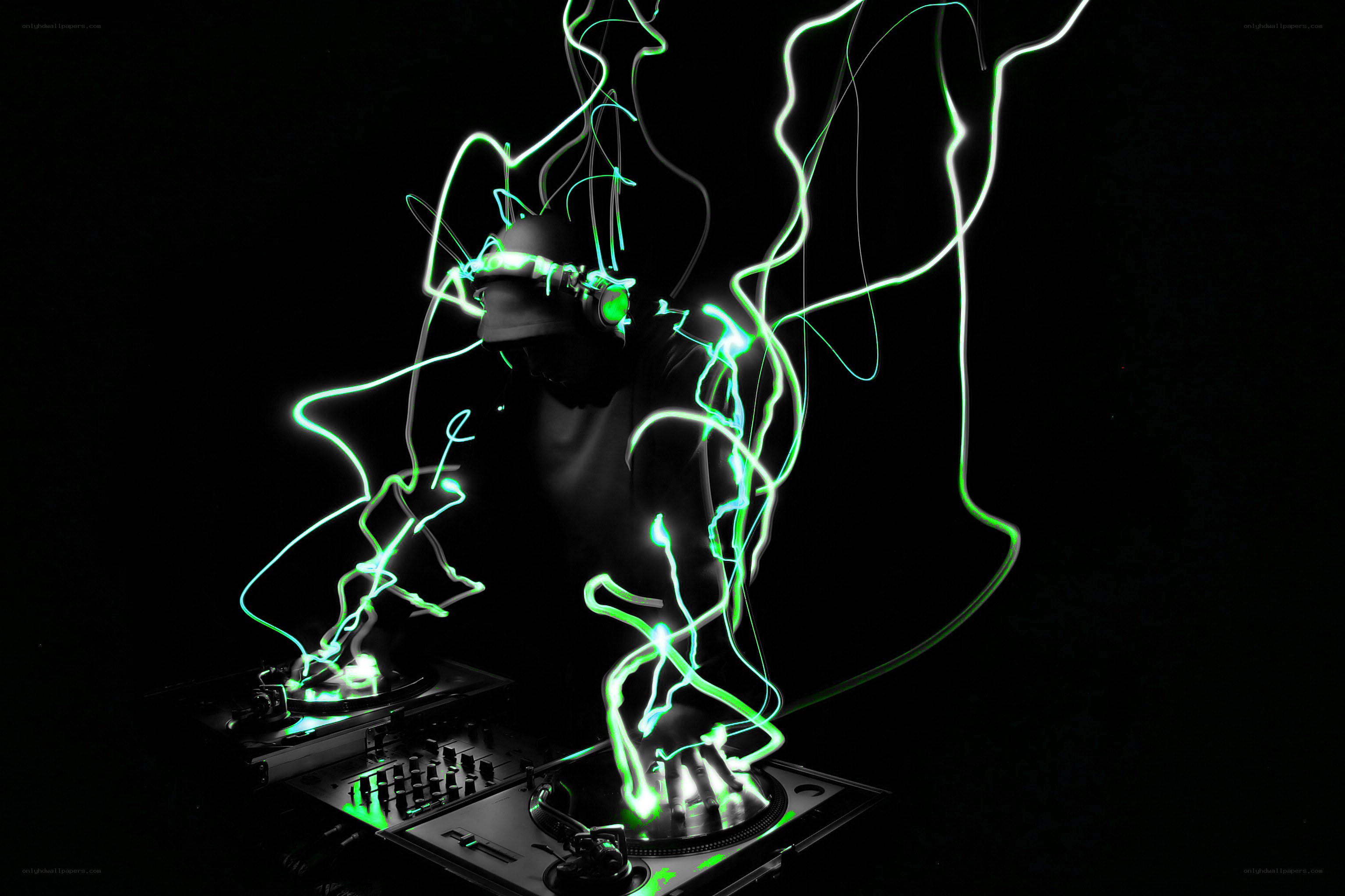 DJ performing with light trails