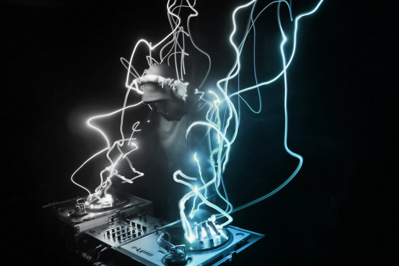 Dj Performing with Light Trails — Black