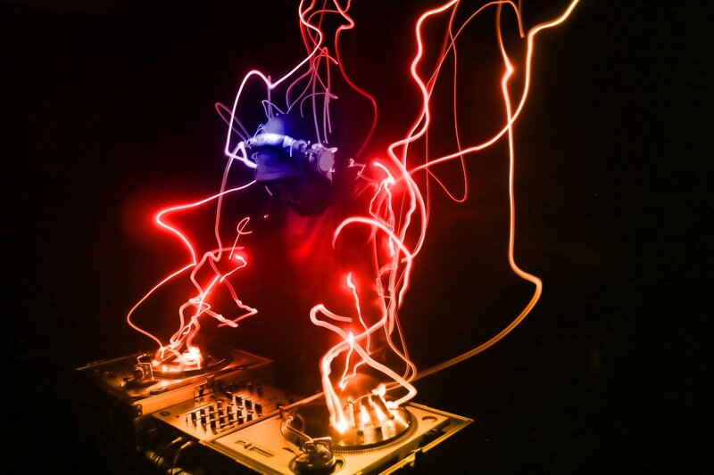 Dj Performing with Lights — Red