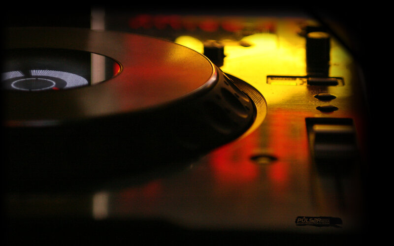 DJ turntable in dim light