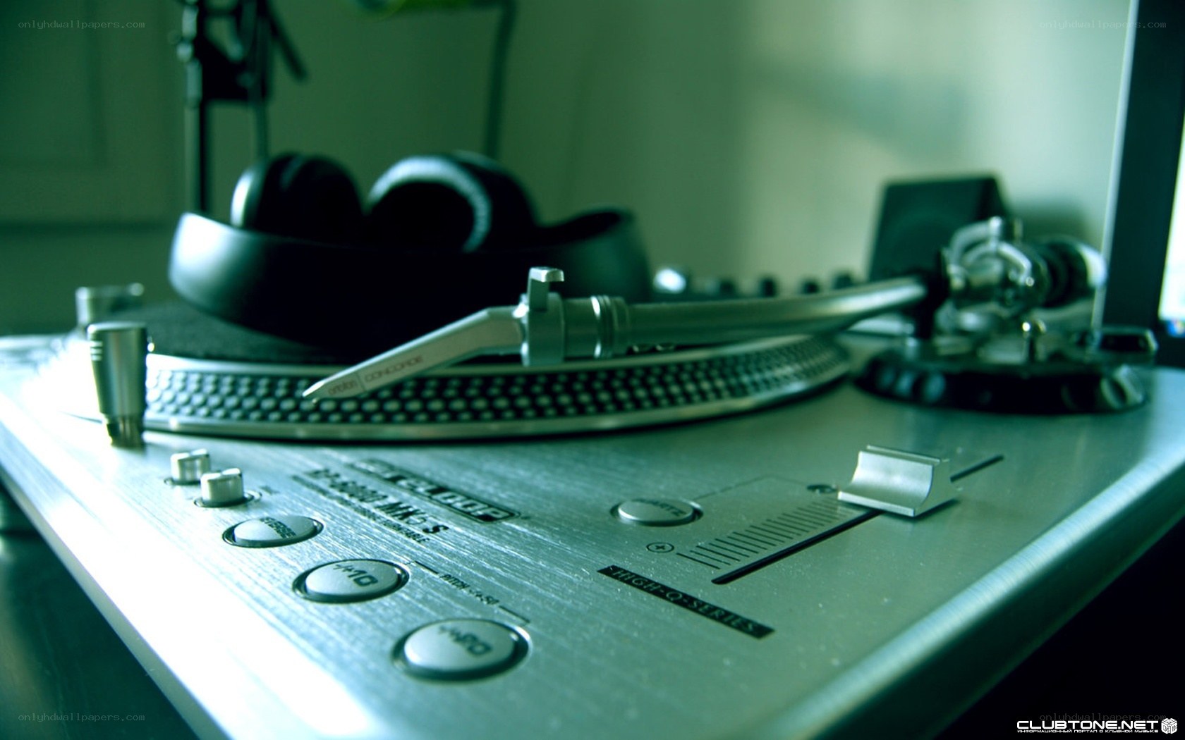 DJ turntable with headphones