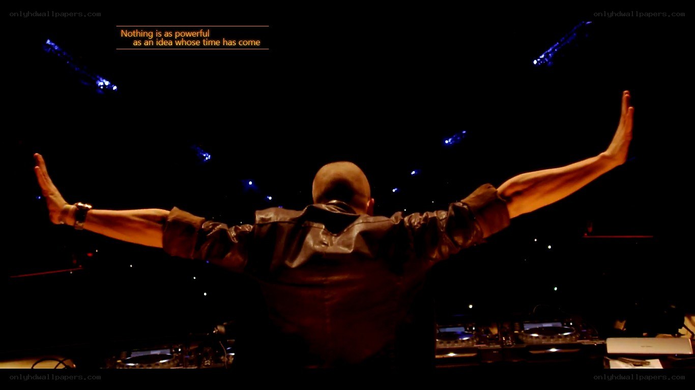 DJ with arms outstretched