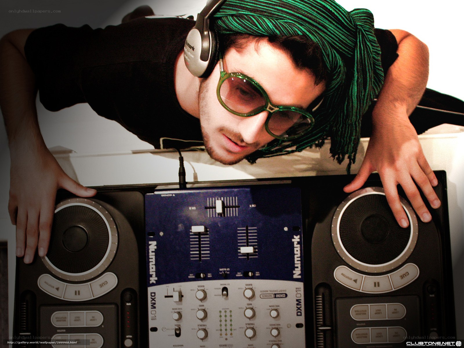 DJ with headphones and sunglasses