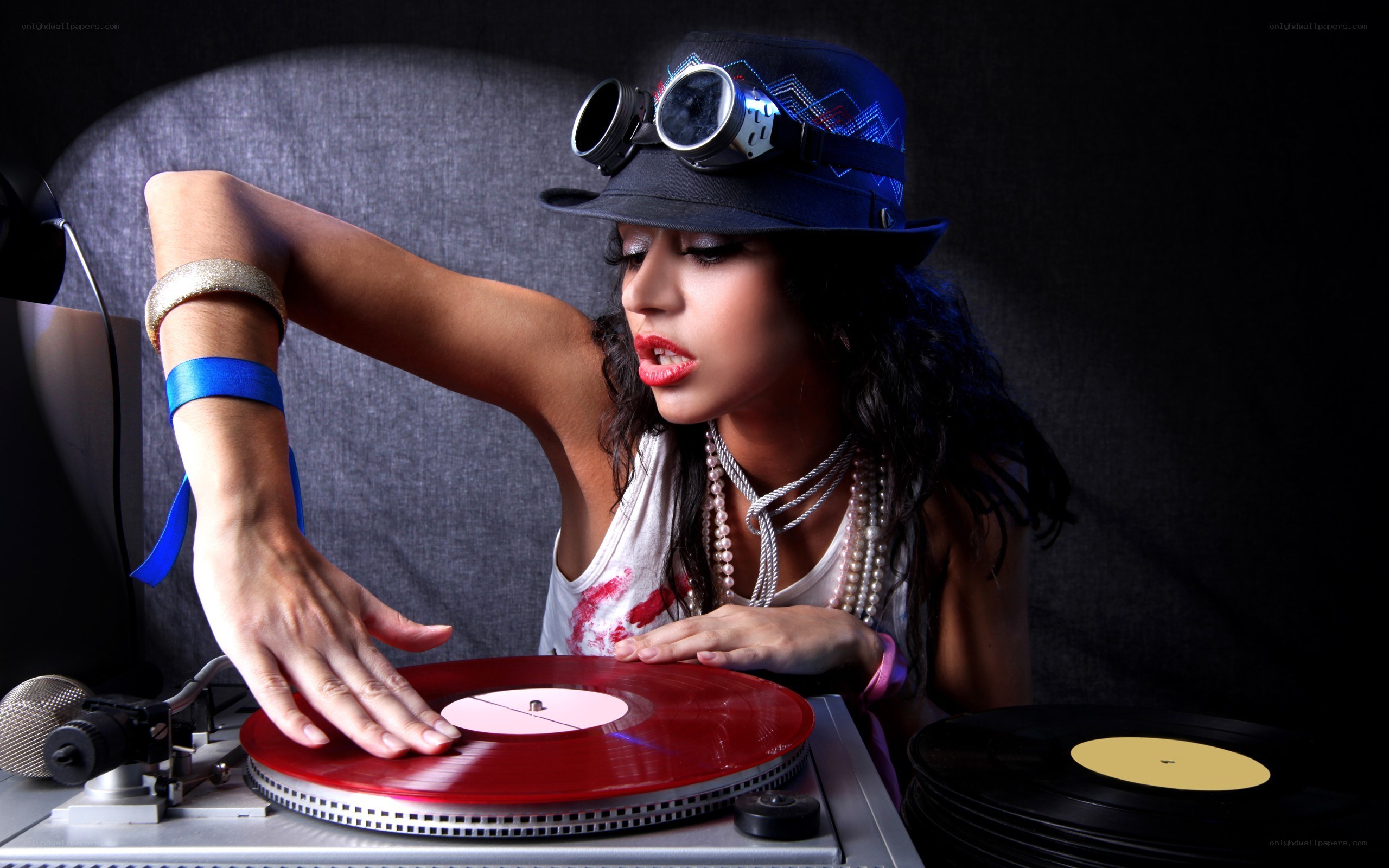 DJ with red vinyl record
