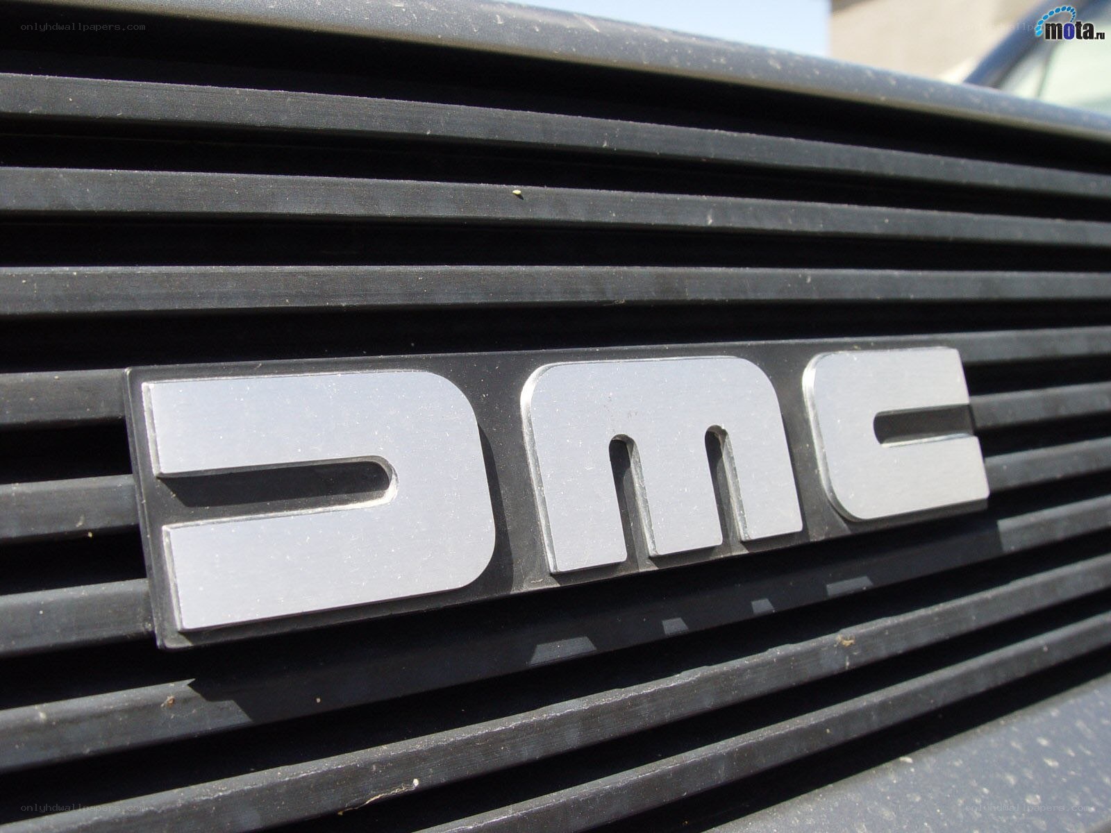 DMC logo on car grille