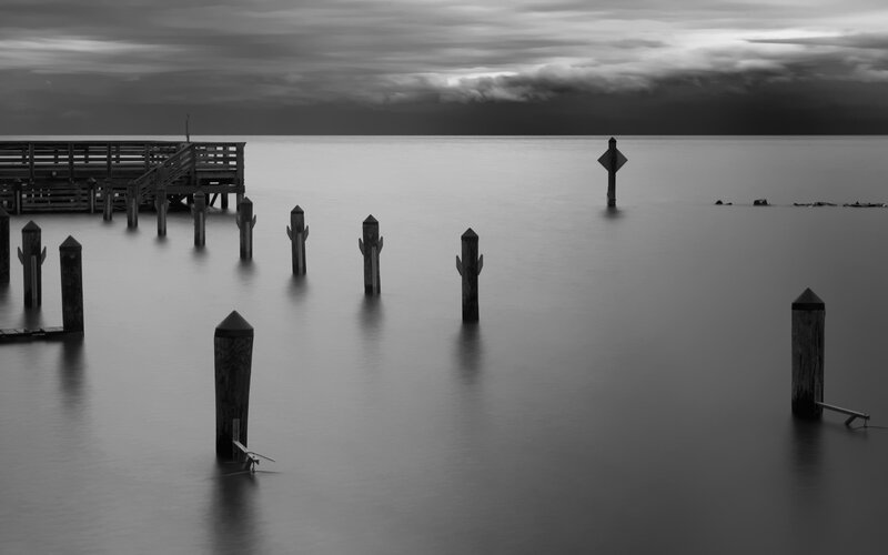 Dock and pilings at dusk