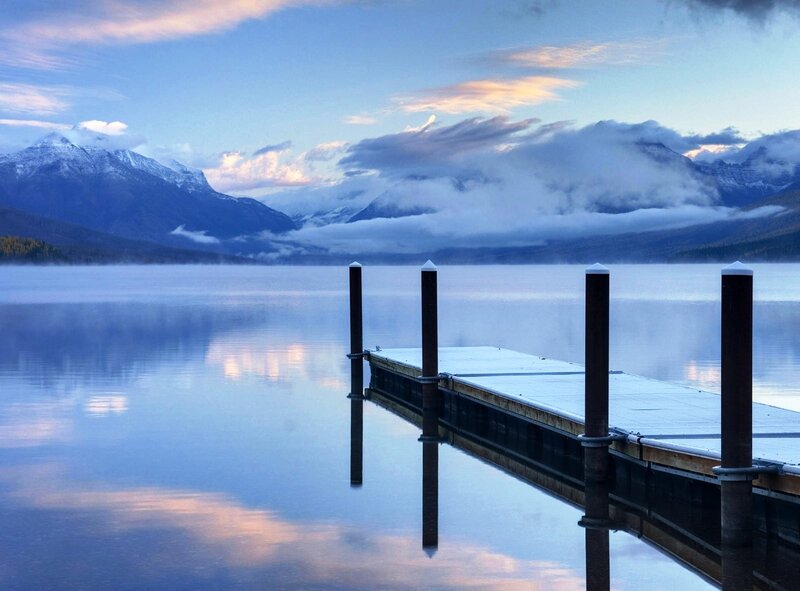 Dock at a lake with mountains
