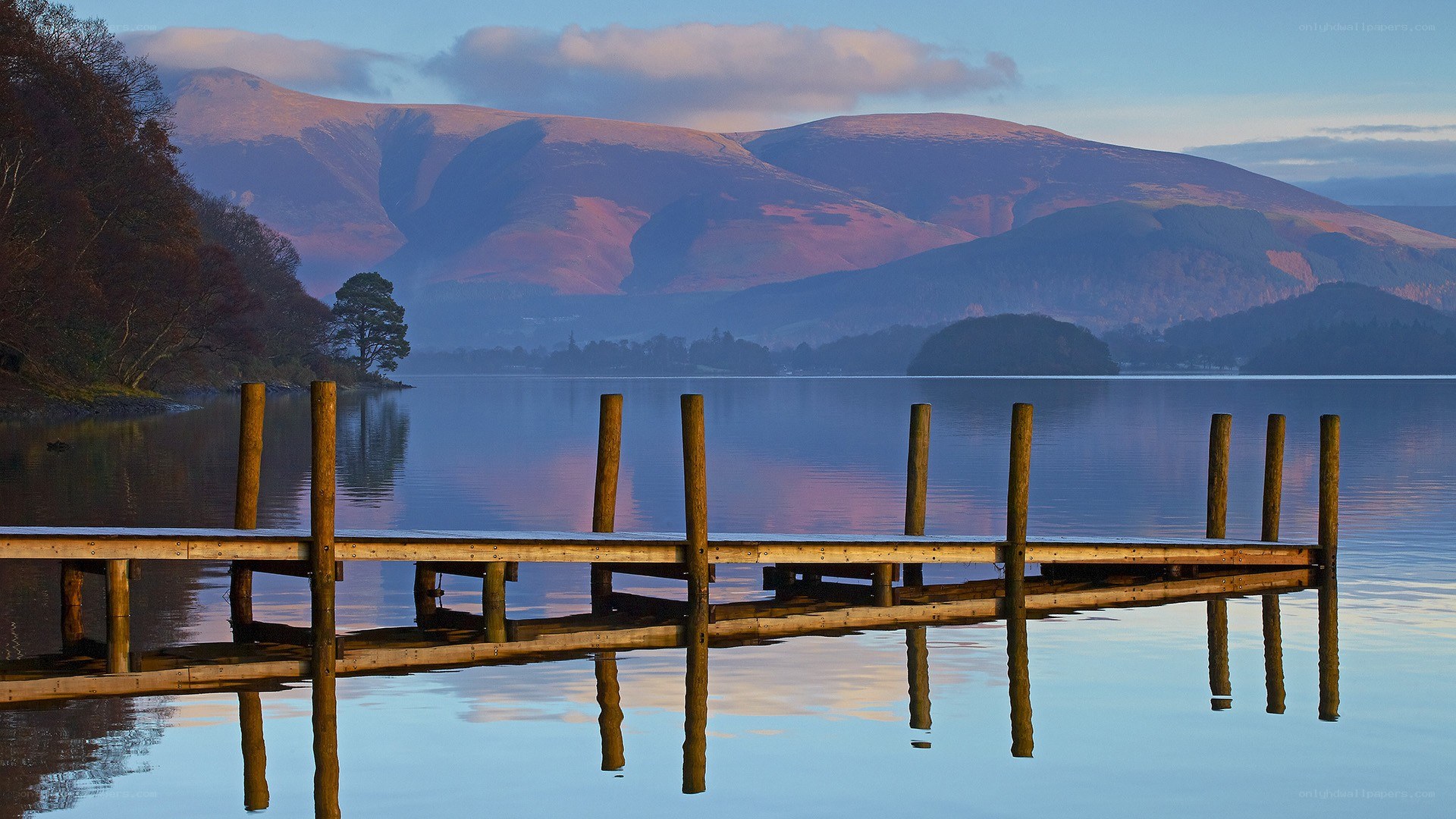 Dock at a lake with mountains