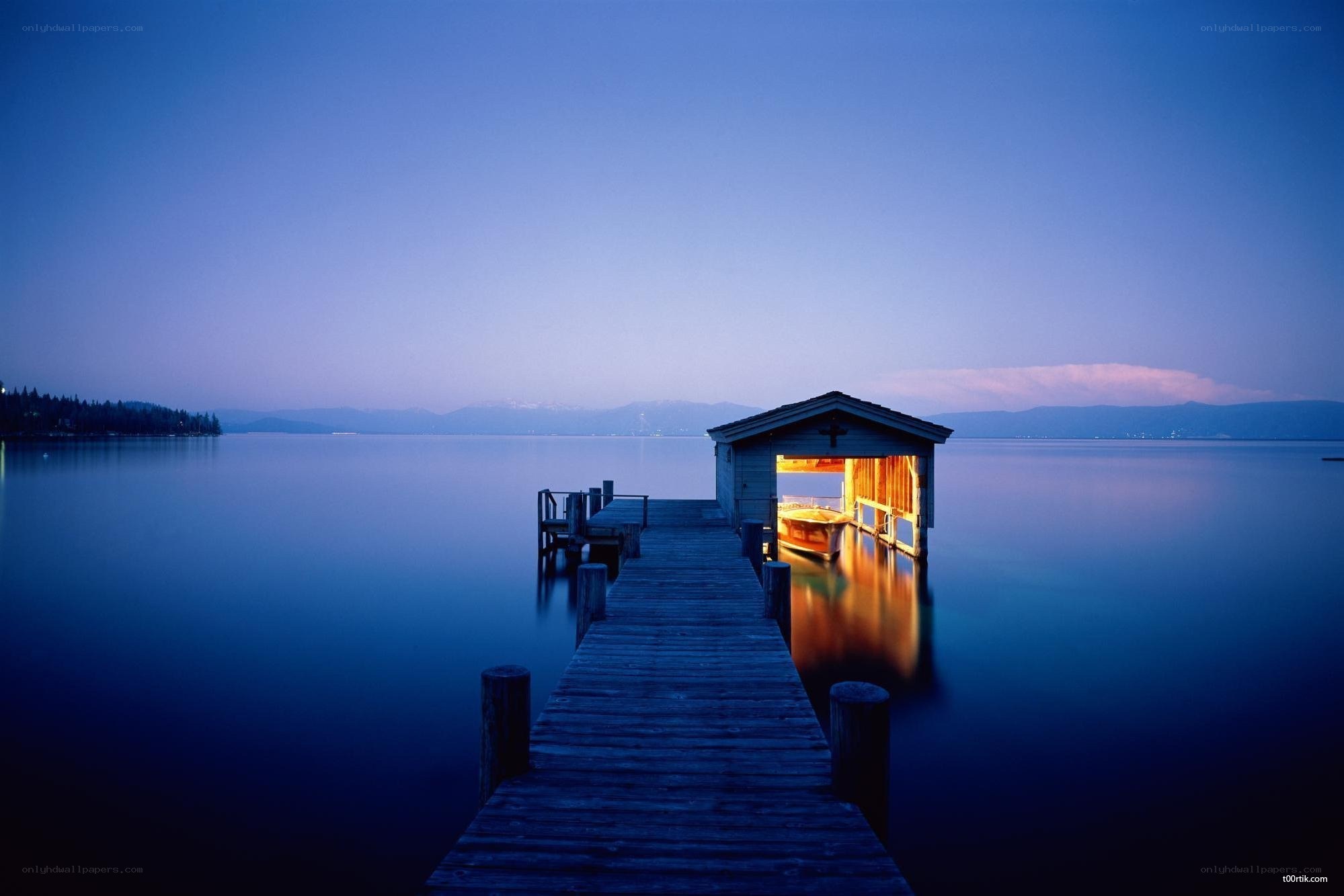 Dock at dusk with boat house