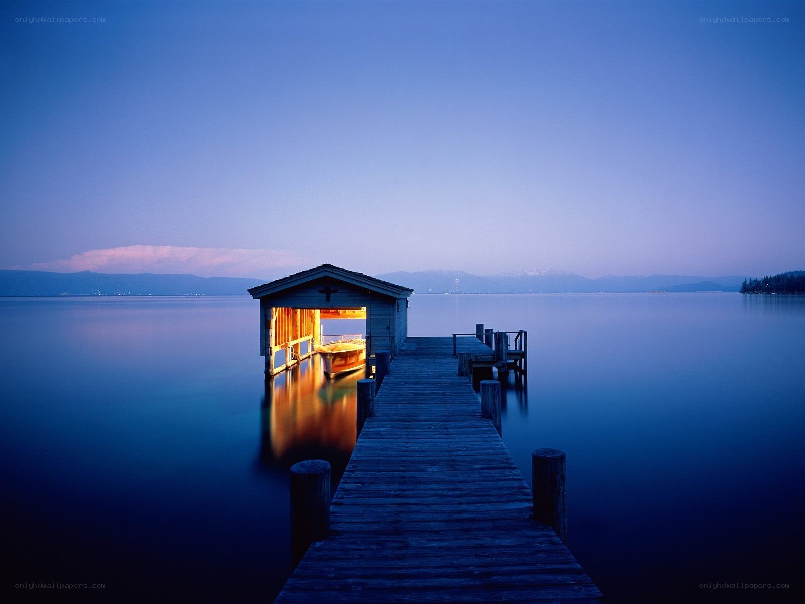 Dock at dusk with boat house