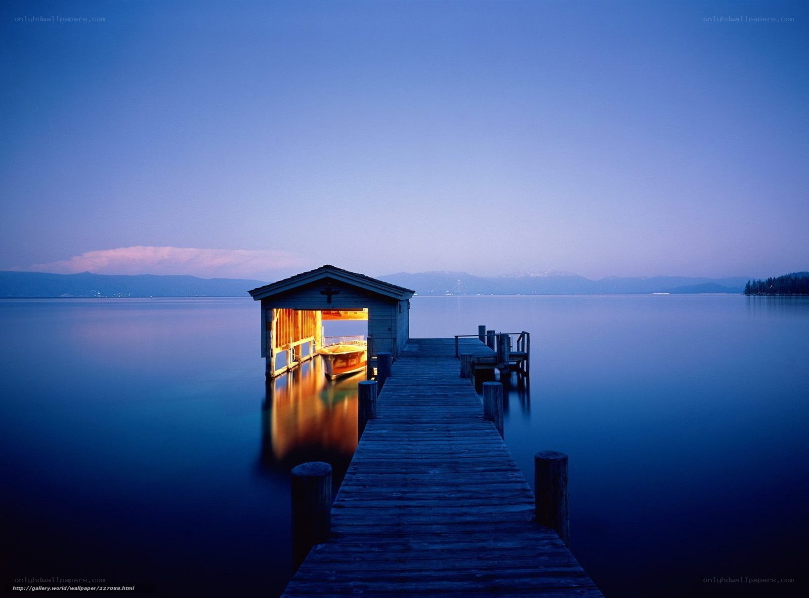 Dock at dusk with boat house