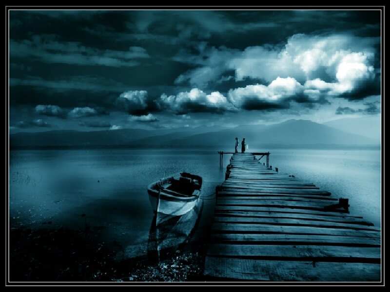 Dock at dusk with boat