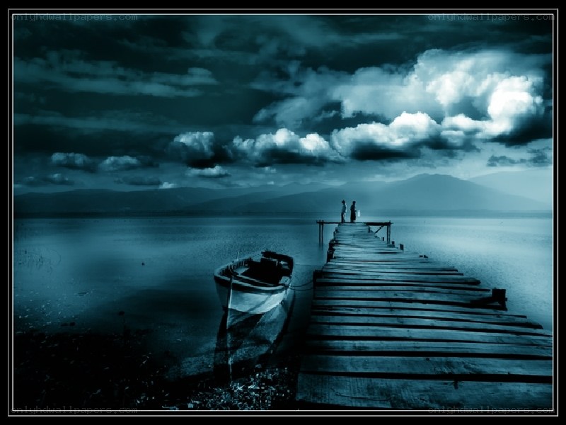 Dock at dusk with boat