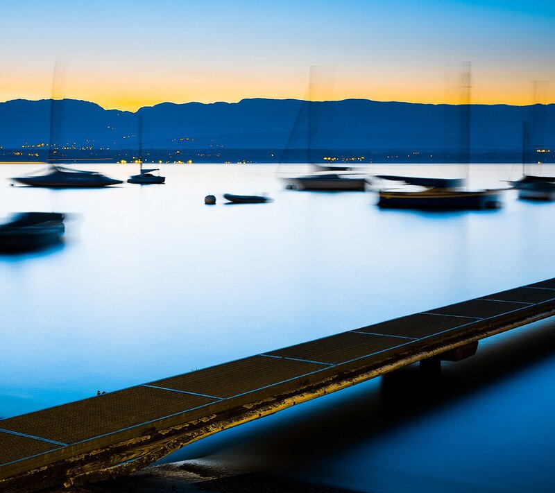 Dock at dusk with boats