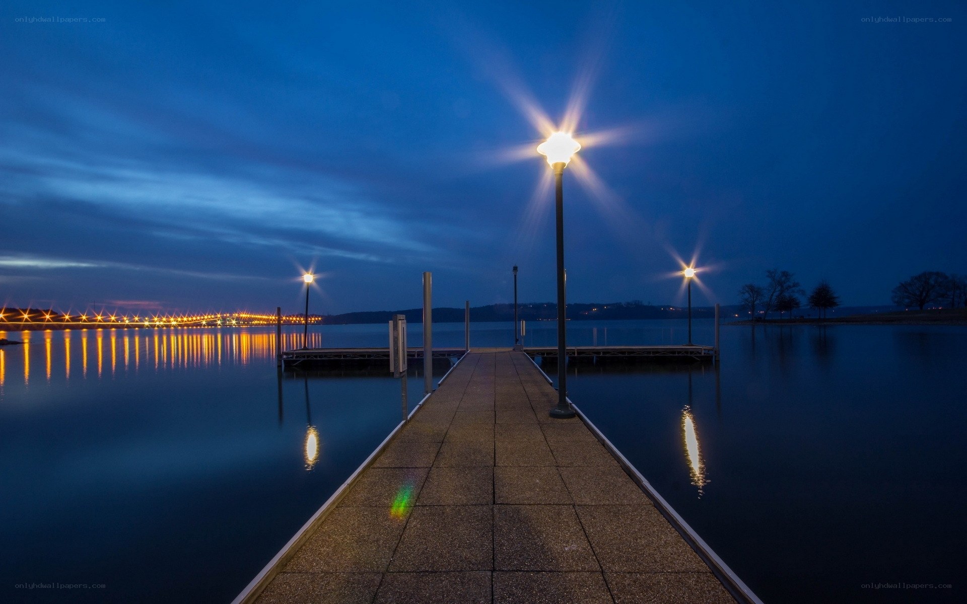 Dock at dusk with lights