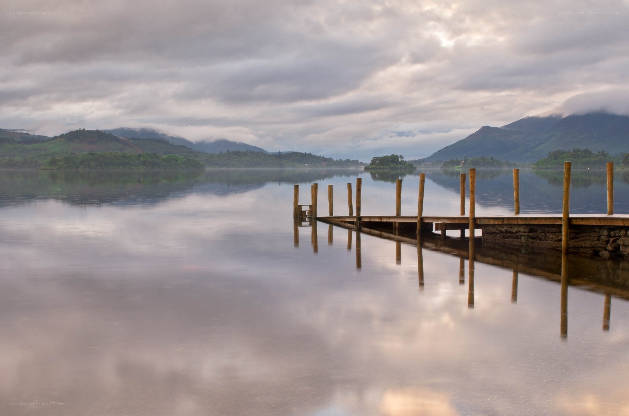 Dock on a misty lake
