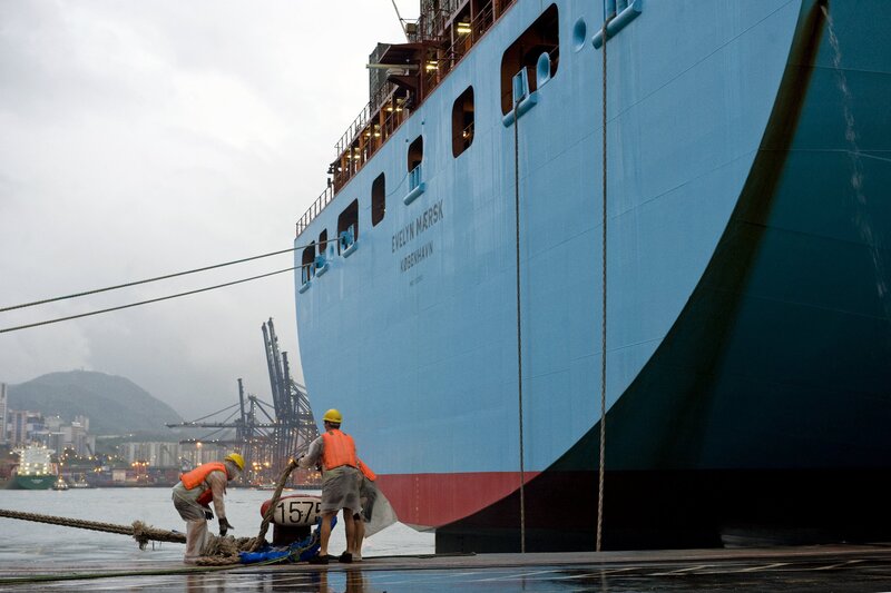 Dock Workers on Pier