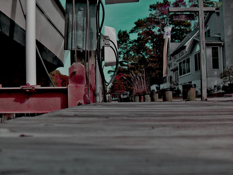 Dockside with boat and houses