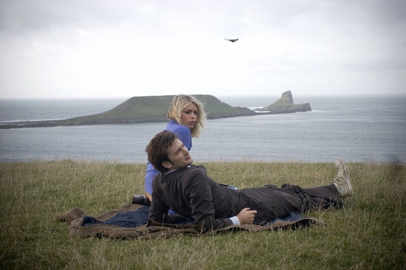 Doctor and companion on a cliff
