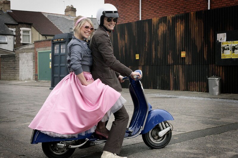 Doctor and companion on a scooter