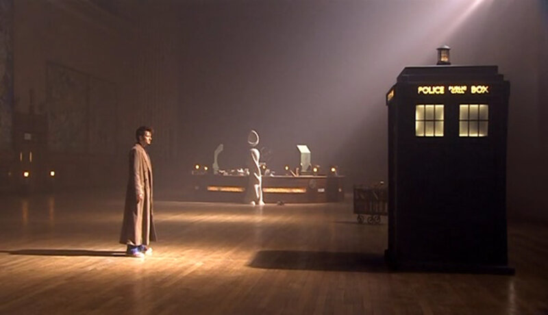 Doctor and TARDIS in a hall
