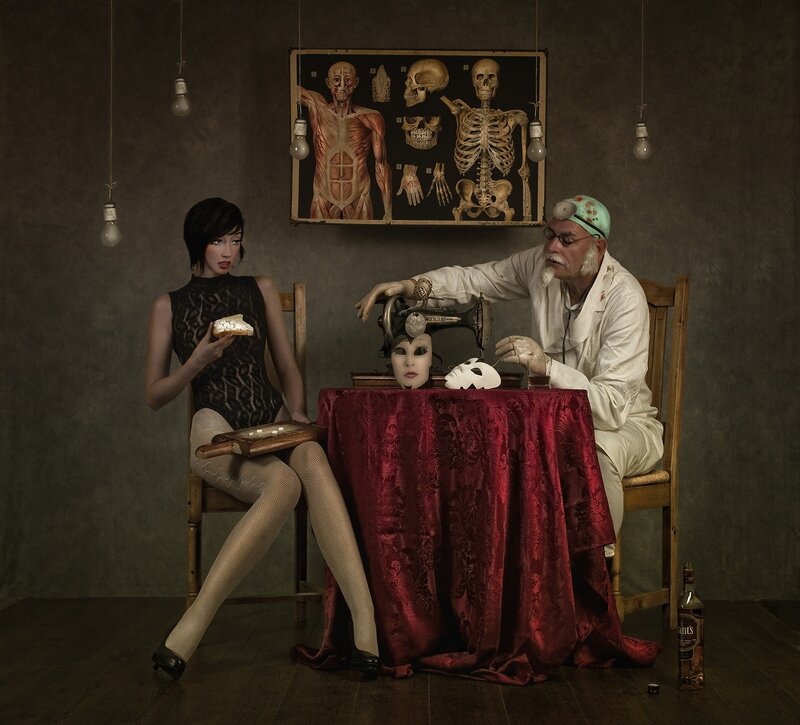 Doctor and woman with anatomical chart